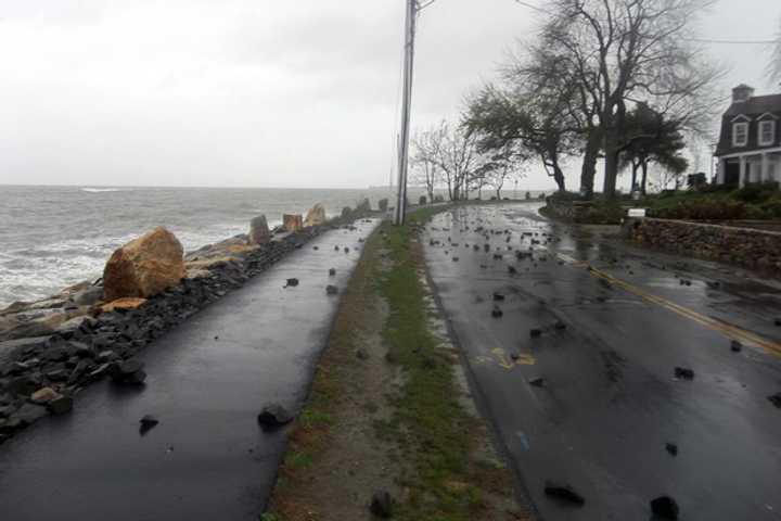 Debris covers a roadway near Compo Beach in Westport following flooding from a past storm.