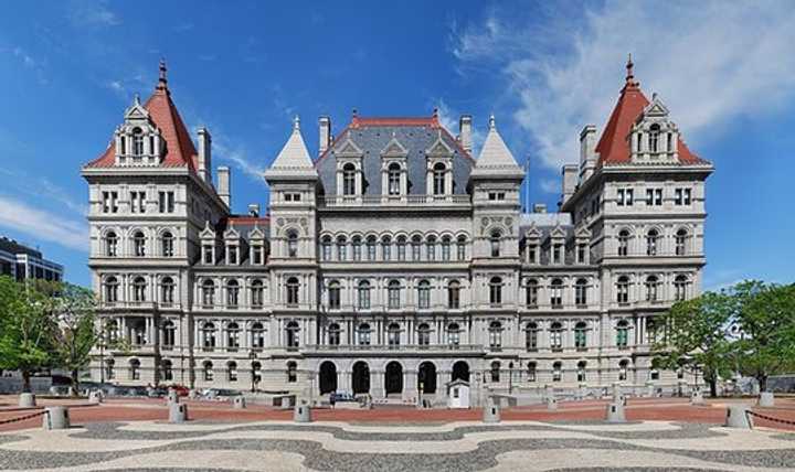 The New York State Capitol building in Albany, where lawmakers made New York the first state to pass legislation allowing women who become pregnant to qualify for health insurance coverage under the Affordable Care Act.