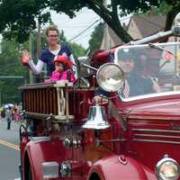 <p>Sunday&#x27;s Great Street Parade honors First Responders. The Bridgeport Fire Department shows off one of its classic trucks.</p>