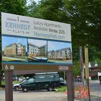 <p>The sign advertises the housing under construction in downtown Danbury, </p>