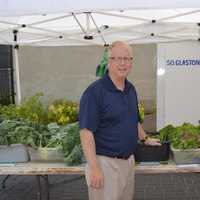 <p>Mayor Mark Boughton checks out the fresh vegetables. </p>