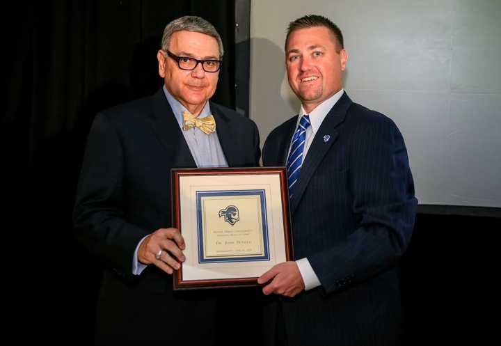 Sacred Heart&#x27;s President John J. Petillo, left, at the Seton Hall University Athletics Hall of Fame induction ceremony with Seton Hall Associate Athletic Director of Development and External Affairs Bryan Felt.