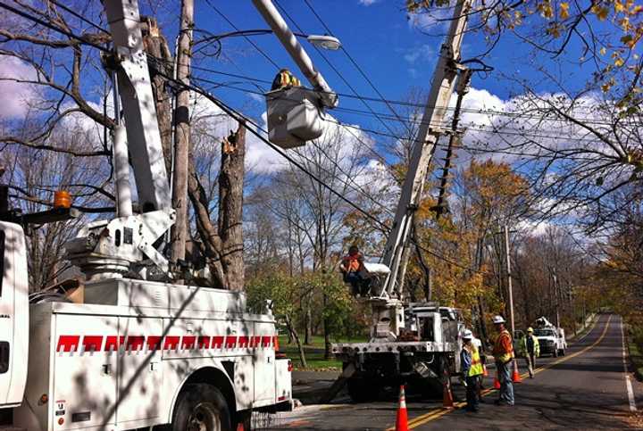 Line crews from all over the country are coming to aid in restoring power to towns like Ridgefield. This crew from Michigan was working on Branchville Road on Friday.