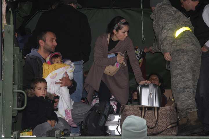 National Guardsmen help residents after Hurricane Sandy.

