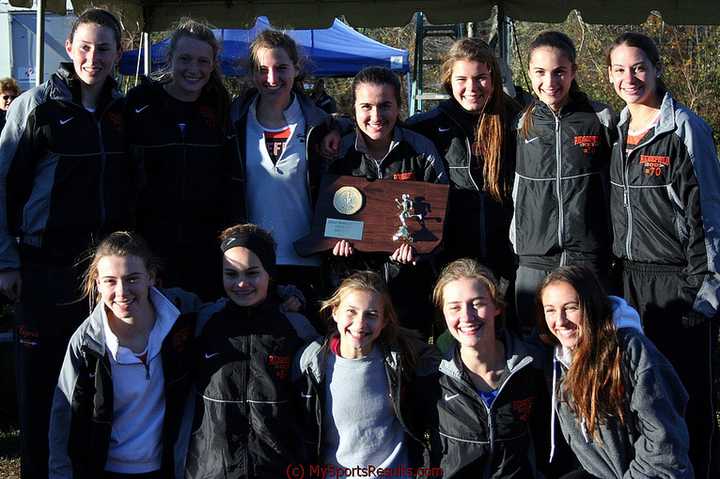 The Ridgefield High girls cross country team wins its second straight State Open title Sunday at Wickham Park in Manchester.