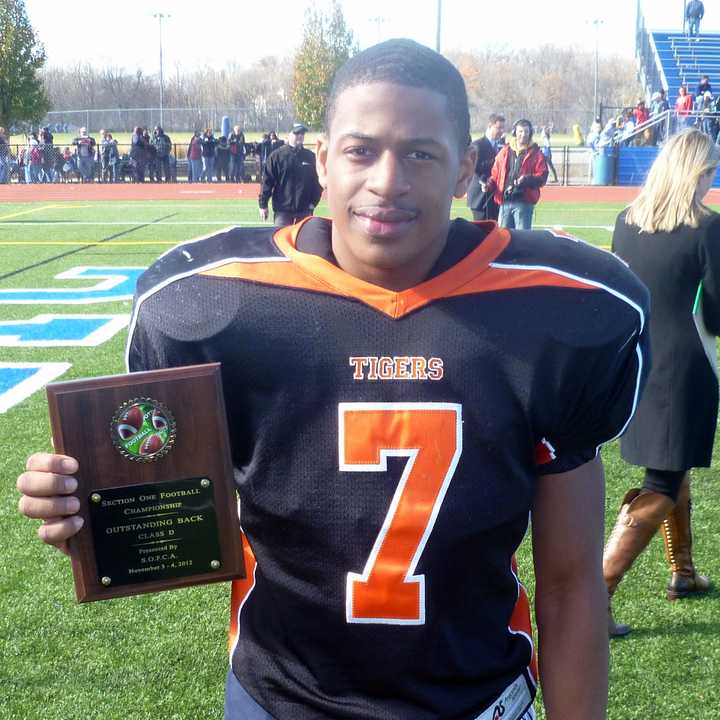 Tuckahoe&#x27;s Shyheim Nixon holds his offensive MVP plaque from the Section 1 Class D championship game.