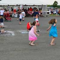 <p>Kids dance to Fast Ricky in the concert before the fireworks </p>