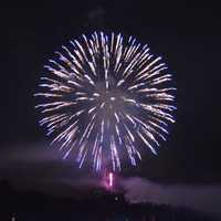 <p>Fireworks explode above the Danbury Fair Mall and Danbury Airport on Thursday evening. </p>