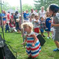 <p>Children dance to the music of the Ray and Jay Band.</p>