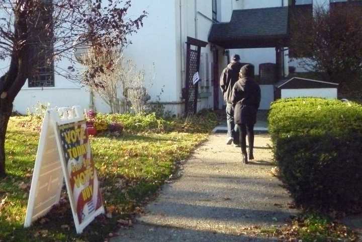 Voters enter Pleasantville Emanuel Lutheran Church to cast ballots Tuesday.