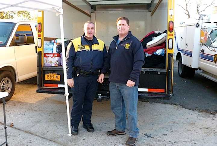 Greenburgh Police Officer Peter Dandreano, left, a Patterson councilman, advised 75 people gathered in Putnam Lake on what to do in the event of a mass shooting.