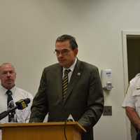 <p>Westchester County police Commissioner George Longworth (center) at a press briefing. </p>