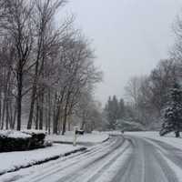 <p>Karla Guimaraes sent in this photo of a snowy stretch of Tanglewood Drive.</p>