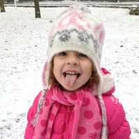 <p>Grayson Brommers, 4, of New Canaan, takes a taste of some snow on Wednesday. Her mom, reader Lisa Brommers, took this photos. </p>