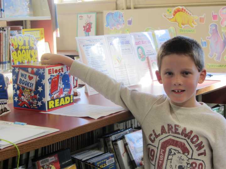 Fox Run Elementary School second grader Jack Murray casts a ballot in the recent children&#x27;s author vote at the South Norwalk Branch Library.