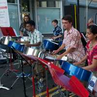 <p>The Jim Royale Steel Drum Ensemble performs for the crowd.</p>