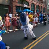 <p>A tug of war ensues between the mascots.</p>