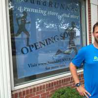 <p>Preston Ranton, general manager of Soundrunner, poses outside of his new store. Soundrunner is scheduled to open its Fairfield location in August.</p>