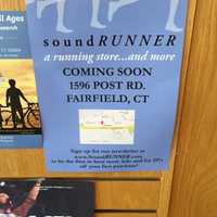 <p>A banner announcing the arrival of Soundrunner hangs on the bulletin board of the Fairfield University Bookstore in downtown Fairfield.</p>