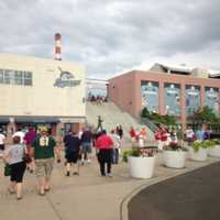 <p>Fans file into the ballpark.</p>