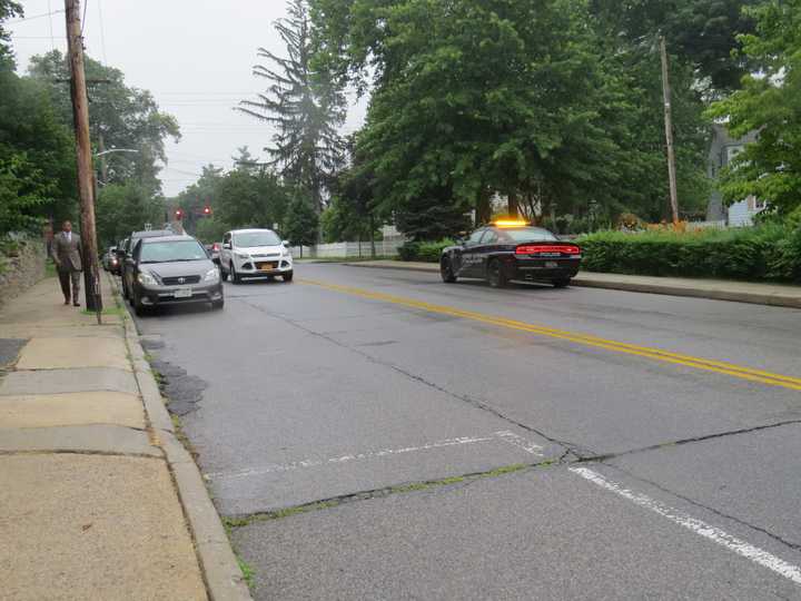 Eastchester police were tasked with expediting foot and vehicular traffic as hundreds made their way to the Immaculate Conception Church in Tuckahoe for John Crimmin&#x27;s funeral on Thursday.