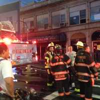 <p>The fire, at a two-story building with a dollar store on the first floor and church on he second, was reported at around 2:45 a.m.</p>