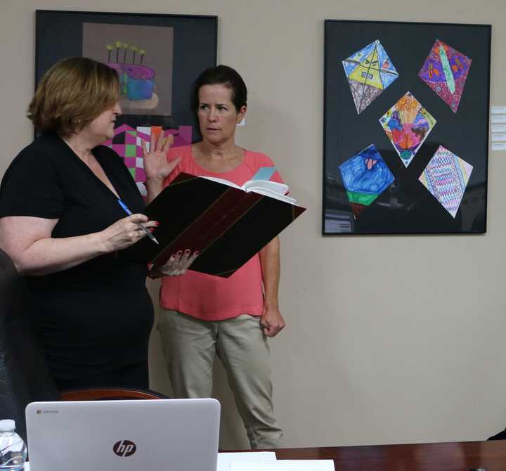 Karen Pressman was sworn in for a three-year term.