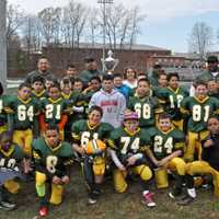 <p>The Norwalk Packers fourth-grade football team celebrates its second-place state finish Sunday in Meriden.</p>