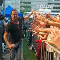 <p>Michael Franti thrills the crowd by getting up close and personal during Thursday night&#x27;s show.</p>