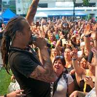 <p>Michael Franti thrills the crowd by getting up close and personal during Thursday night&#x27;s show.</p>