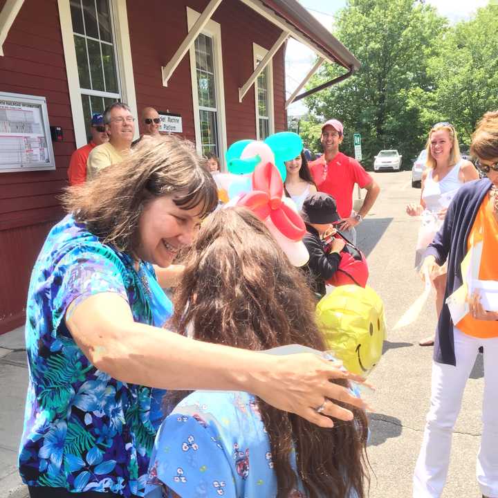 Midge Pappas greets Nathaly, her Fresh Air guest, on Saturday afternoon. 