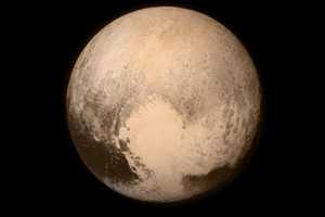 NASA Completes Three-Billion Mile Visit  With Flyby To Pluto