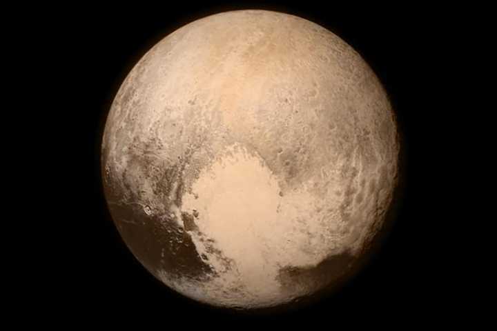 NASA Completes Three-Billion Mile Visit  With Flyby To Pluto