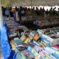 <p>Book lovers comb through the selection of books at last year&#x27;s sale.</p>