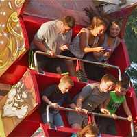 <p>Kids ride on the Sea Ray, an oversized swing, at the MVFD carnival.</p>