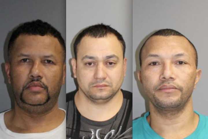 Tomas Morel, left, Carlos Guillen, center, and Vincente Morel, right, were arrested by Norwalk police on larceny charges Thursday in connection with the theft of $83,800 worth of handbags from Dooney &amp; Bourke in Norwalk. 