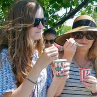 <p>Laureen (right) and Emu Haynes, of Westport, enjoy a cool Italian ice on one of the hottest days of the year.</p>