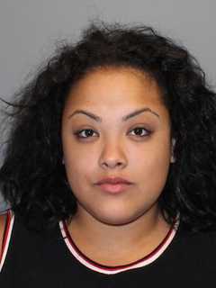 Norwalk Police: Woman Kicked Officer, Threw Bottle At Car