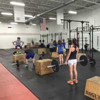 <p>CrossFit Westport members enjoy a class Tuesday.</p>