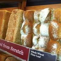 <p>Part of the &quot;wall of bread&quot; at the new COBS Bread bakery in Stamford.</p>