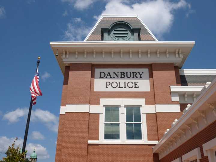 A woman was shot outside a Danbury social club Saturday, police said. 