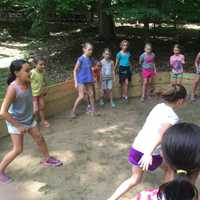 <p>Girls hit the Gaga Ball Pit at Camp Aspetuck in Weston on Wednesday. </p>