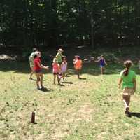 <p>Campers hit the field for games at Camp Aspetuck in Weston. </p>