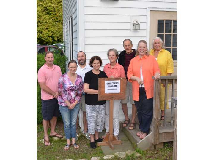 Emmanuel Church Family Fair volunteers from left: Boyd Relac, Priest in Charge Katy Herron Piazza, Charlie Shipman, Betsy Ready, Chris Juneau, Dan Wilder, Ellen Uzenoff and Donna Wilder. 