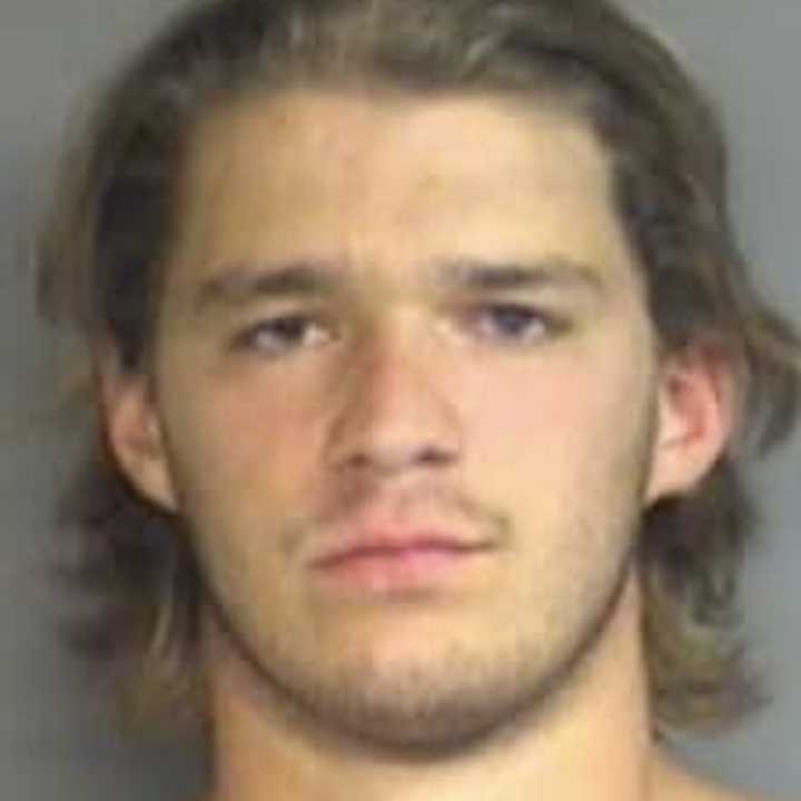 Richard Todd Stafford, a football player at the University of Massachusetts, was one of three Greenwich men charged in an assault of a Darien man in Stamford over a cigarette. 