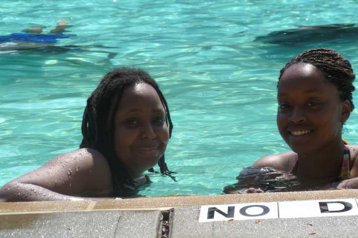 Alexis Frank, left, and Andee Pace swim at Kittrell Pool prior to the recent renovation. 