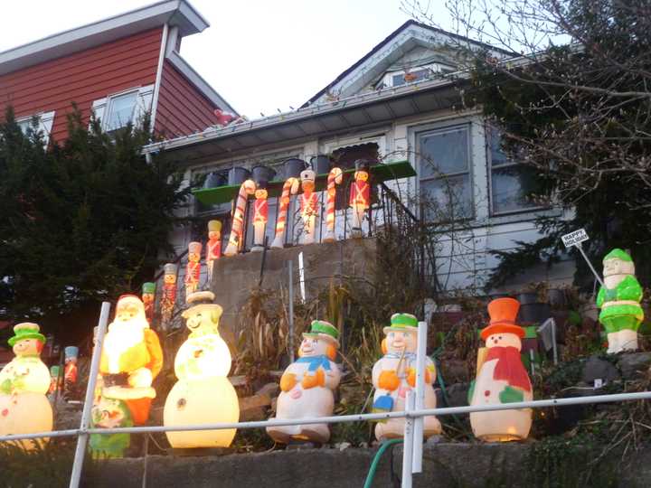 Friends and family pitched in to decorate the home of the late Jesse Buzzutto of Yonkers as he did for many years.