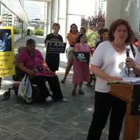 <p>Sharon Boland from Greenwich spoke to about 150 people who gathered in front of the Government Center in Stamford on Tuesday to protest abortion and to demand that Planned Parenthood be defunded.</p>