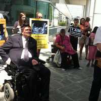 <p>State Sen. Michael McLachlan, R-Danbury, speaks while a former Stamford state Rep. Michael Molgano looks on. </p>