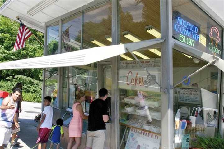 People around Fairfield County find ice cream is a great way to cool off on a hot day, here at a popular spot in Ridgefield. 